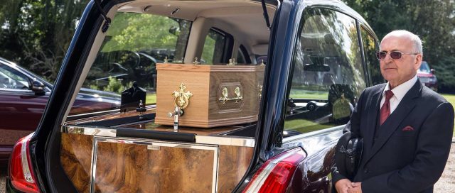 Alex Jones Funeral Directors - The Eden coffin in a black hearse