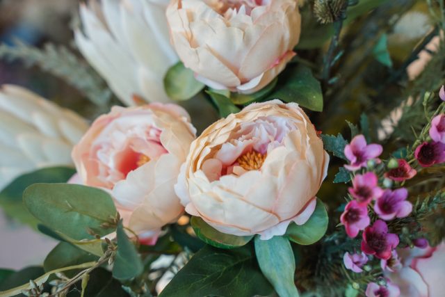 Alex Jones Funeral Directors - Peach Peonies floral arrangement